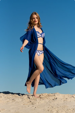 Navy sheer chiffon maxi kimono cover-up flowing on a sand dune