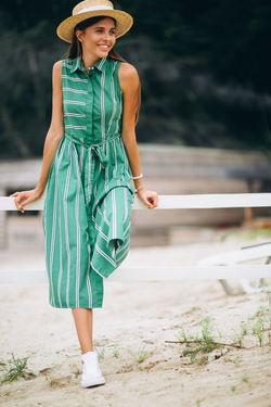 Green striped sleeveless shirt midi dress, front view on the beach
